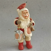 antik julemand rød stof dragt sæk og lygte i hånden gammelt julepynt.